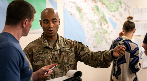 Homeland Security Graduate Program student Javier Whyte participates in the end of semester EOC exercise for HSEC 603. Photo credit: Gary Payne.