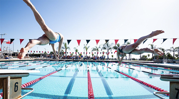 SDSU swimming and diving team competing at the Aztec Aquaplex (Photo: Derrick Tuskan/GoAztecs.com)