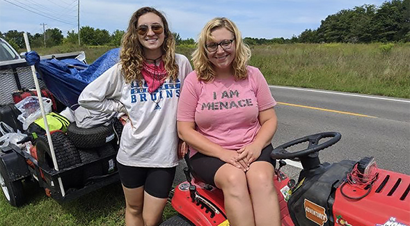 SDSU student entrepreneur Tiffany Gil (left) is shown with her Great Grass Race teammate Katie Knight.