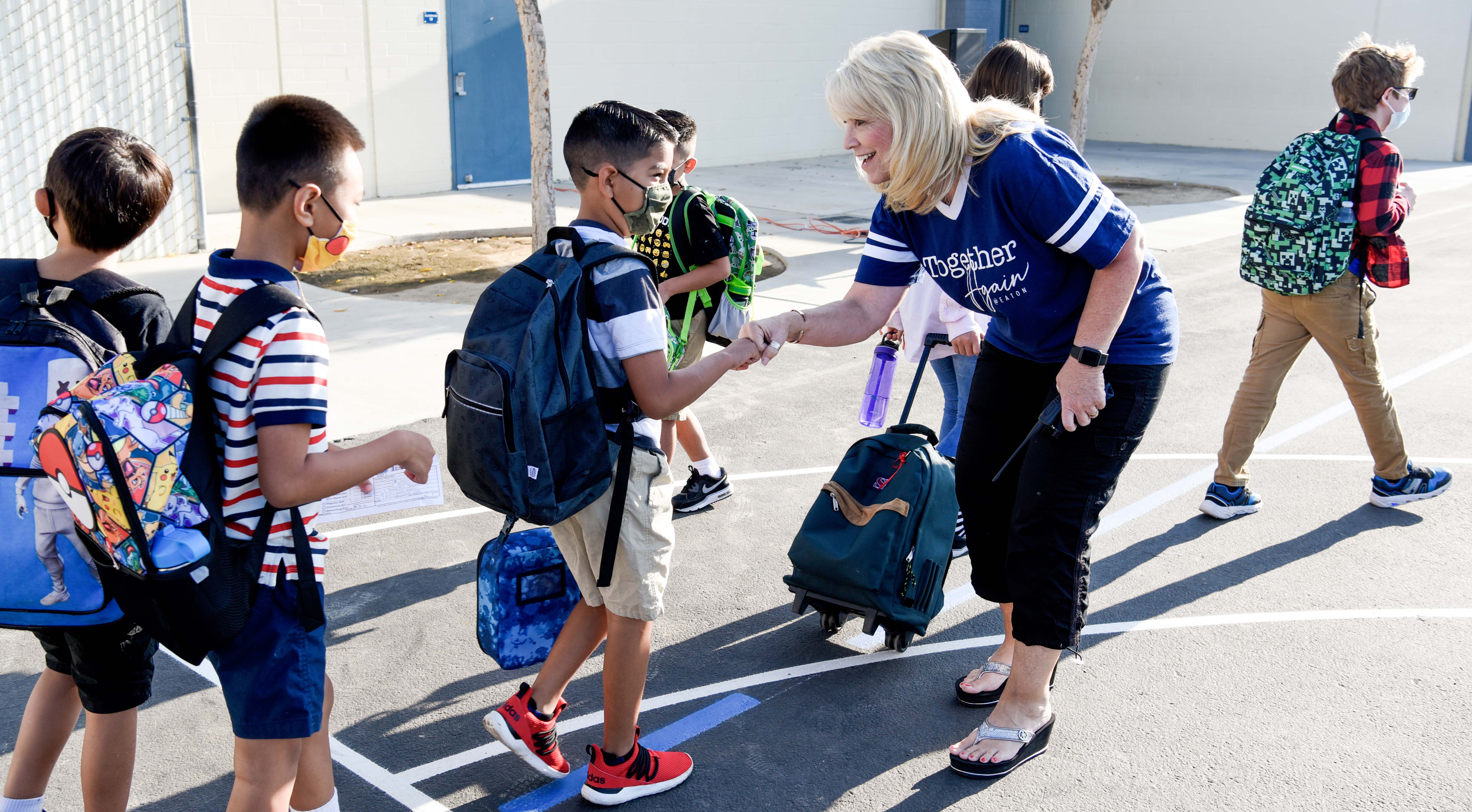 Principal Beth Beuttner greeted students at Fresno's Eaton Elementary School, part of a district partnering with SDSU on an equity project.