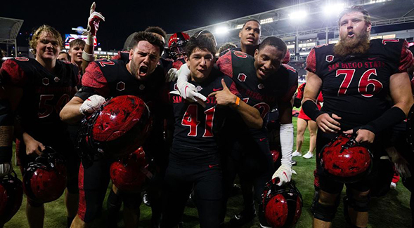 The Aztecs celebrated their 23-21 win over Nevada on Saturday.