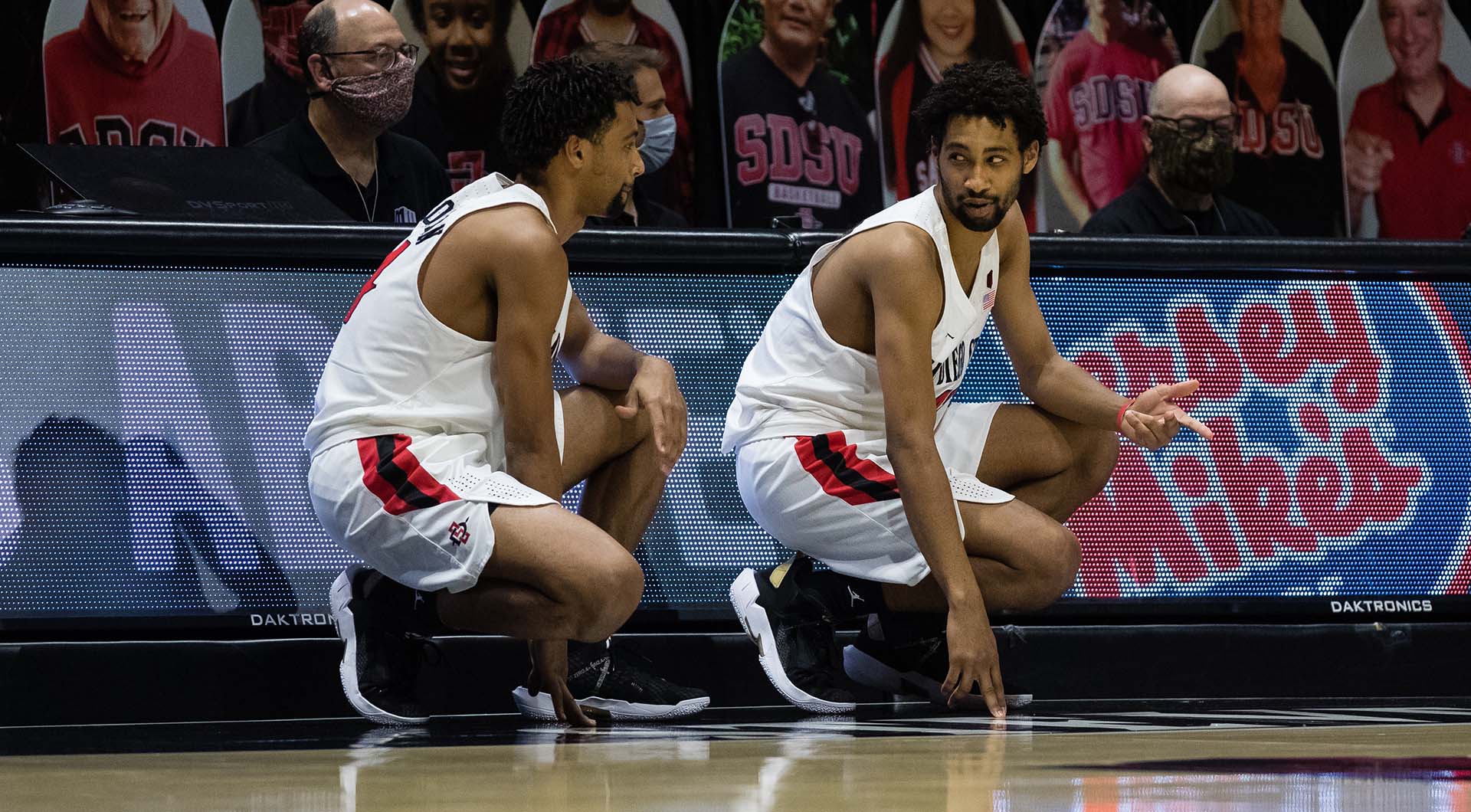 Tyler Broughton (left) and his brother Triston Broughton, seen on the court during the last season.