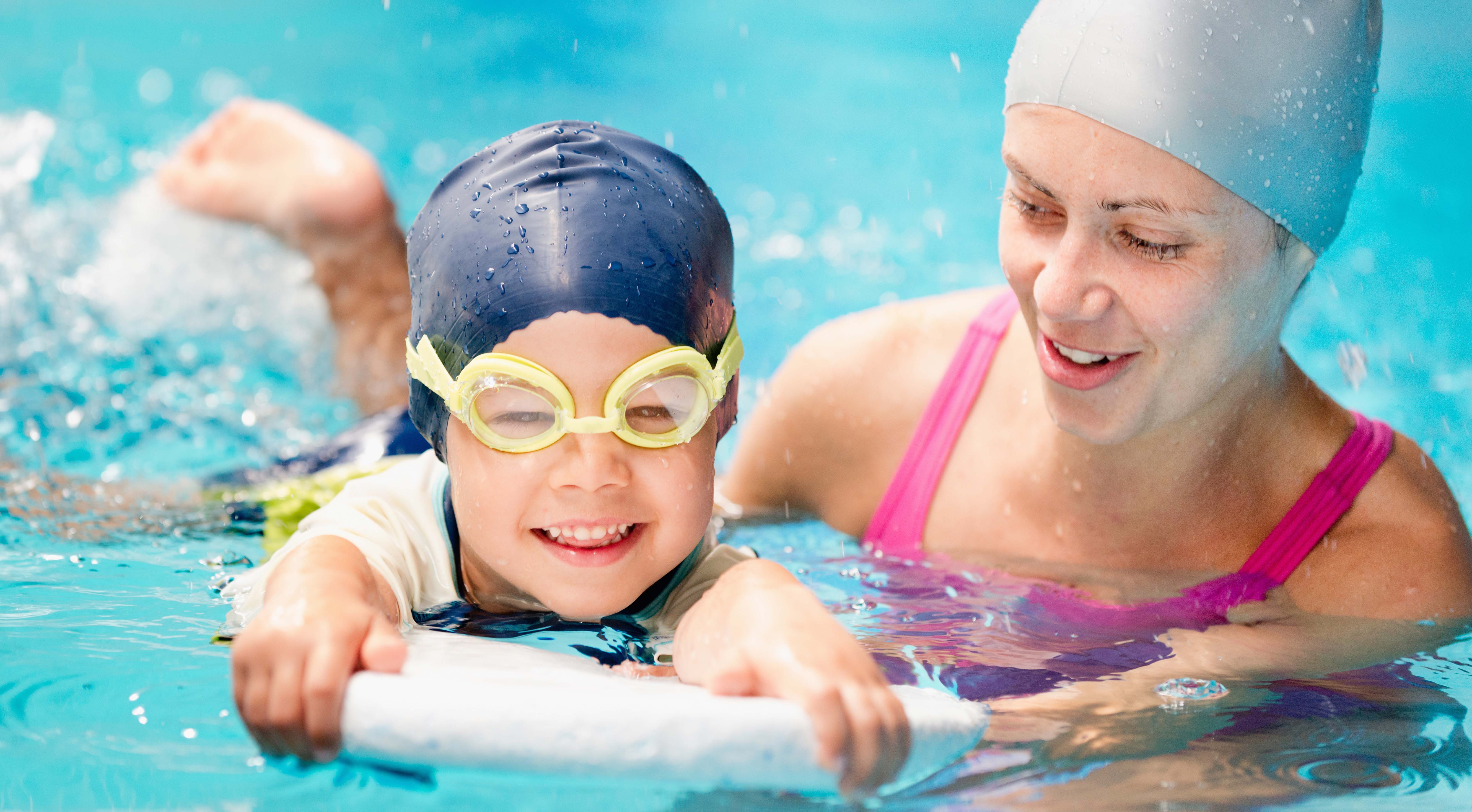 Pictured above, a child kicking in a swimming pool (file photo).