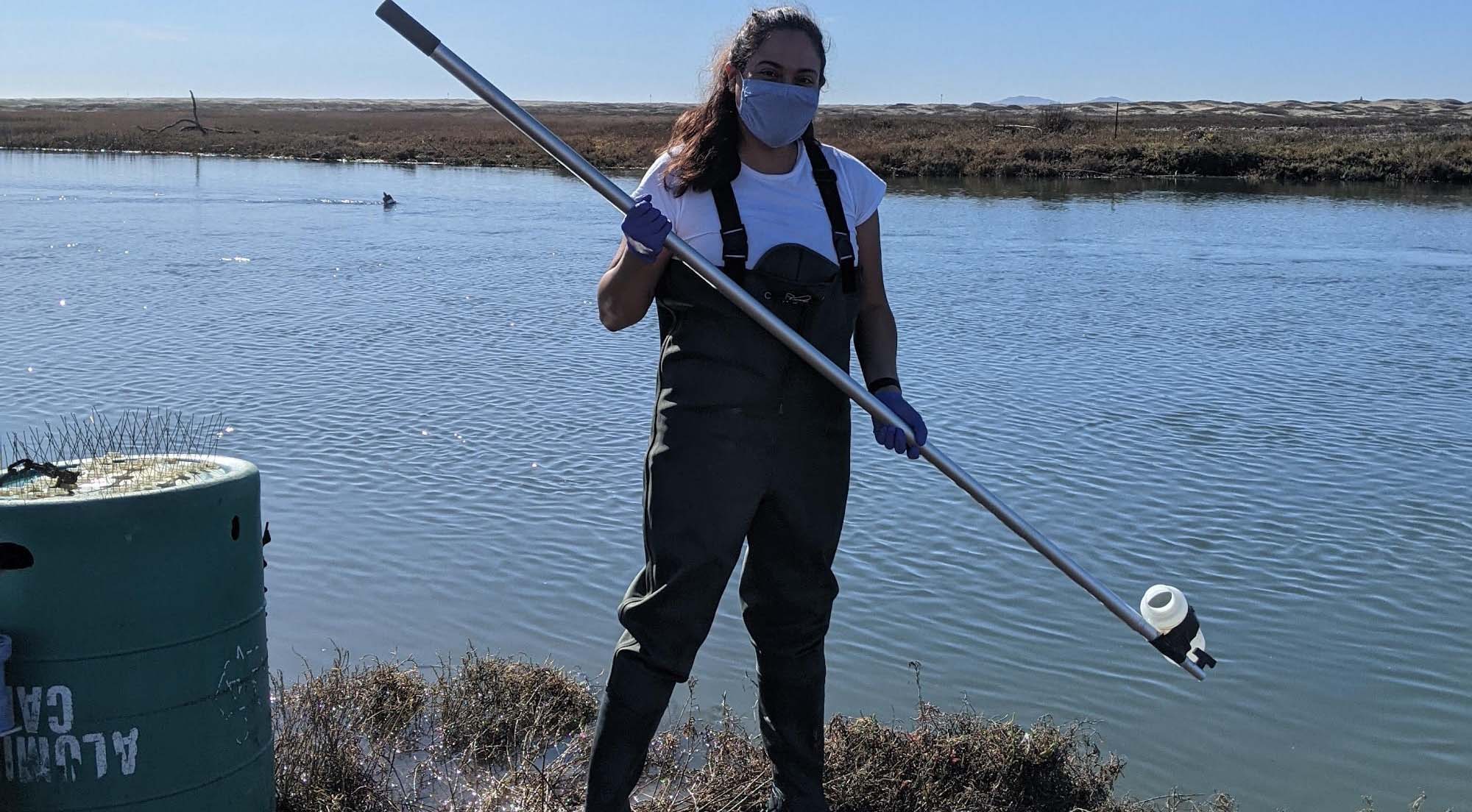 Sally Casanova scholarship recipient Alma Rocha collected water samples from the contaminated Tijuana River.