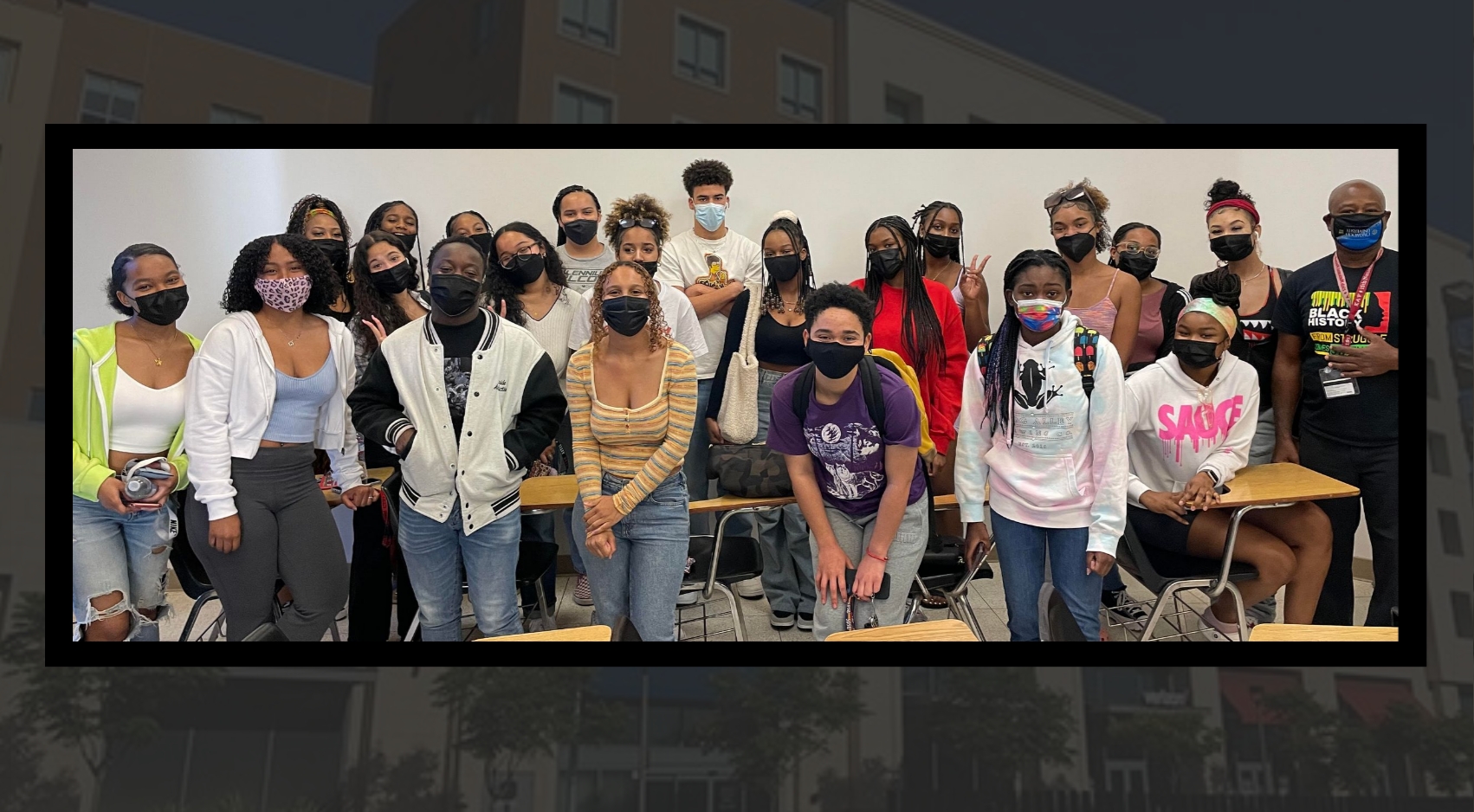 Students pose for a photograph inside the Black Excellence Floor at San Diego State University's Campus Plaza South Tower.