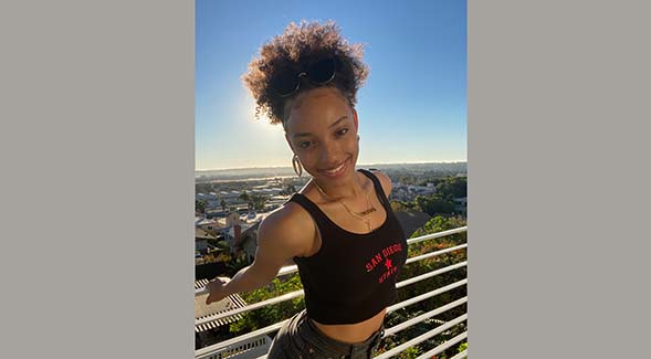 Communications major Courtney Willis posed on an overlook.