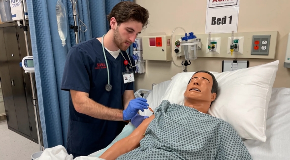 Reece Kerstetter in the School of Nursing Skills lab at San Diego State University.