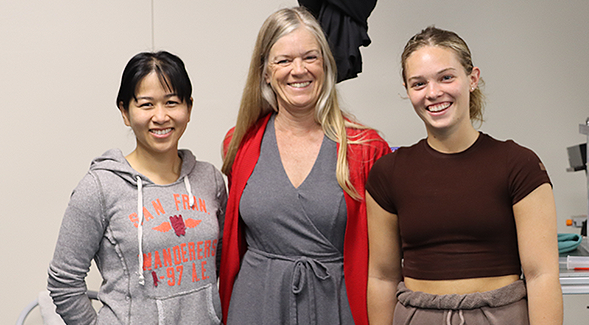 Karen May-Newman (center) poses with postdoctoral researcher Vi Vu (left) and undergraduate researcher Britton Mennie in the Cardiovascular Bioengineering Lab.
