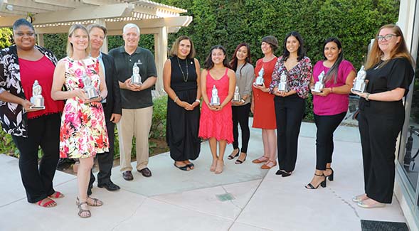 The 2022 SDSU Presidential Staff Excellence Award recipients were honored at University House by President Adela de la Torre (identifications at bottom of article). (Photo: Scott Hargrove)