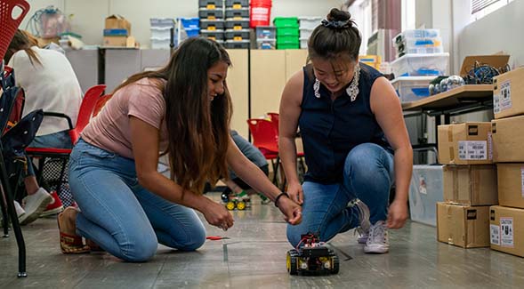Local teachers performed science at a June 2022 coding workshop headed by associate professor Donna Ross.