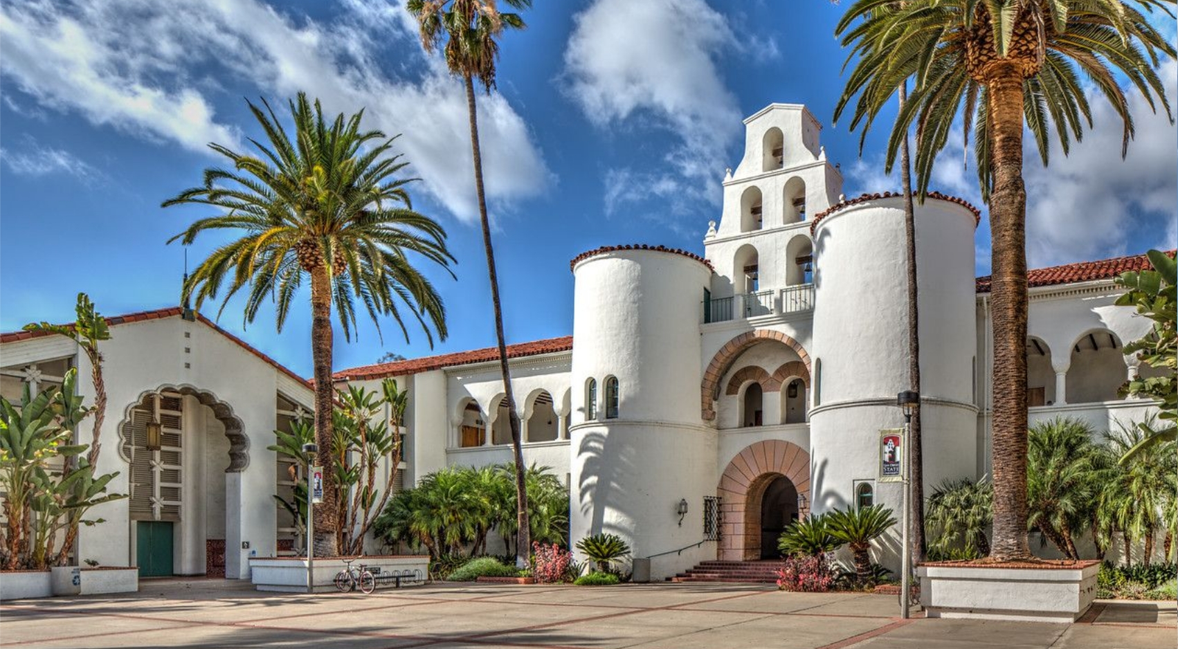 The image features San Diego State University's Hepner Hall.