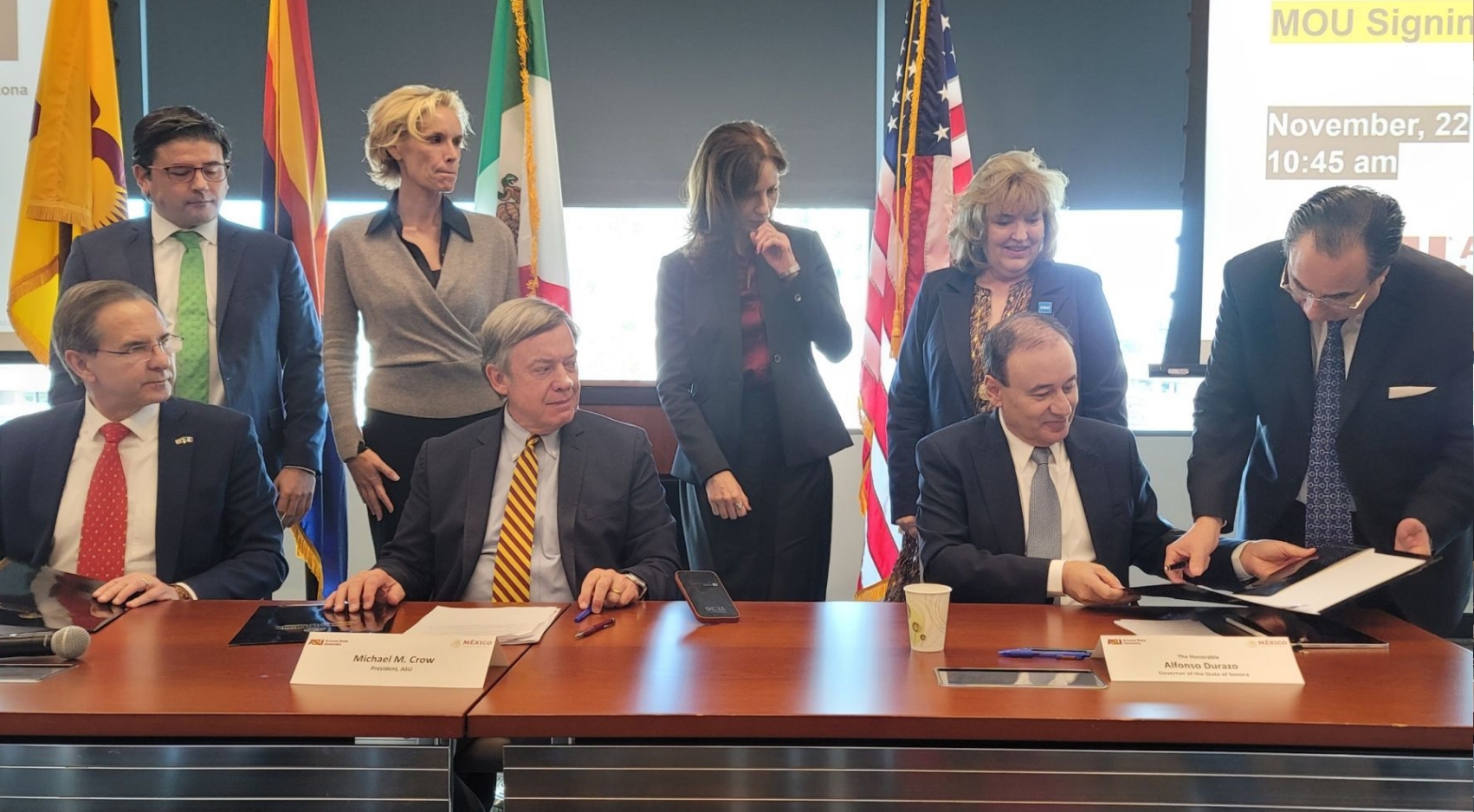 Octavio Martnez (far right) signs as honorary witness the MOU on semiconductor cooperation between the US and Mexico.