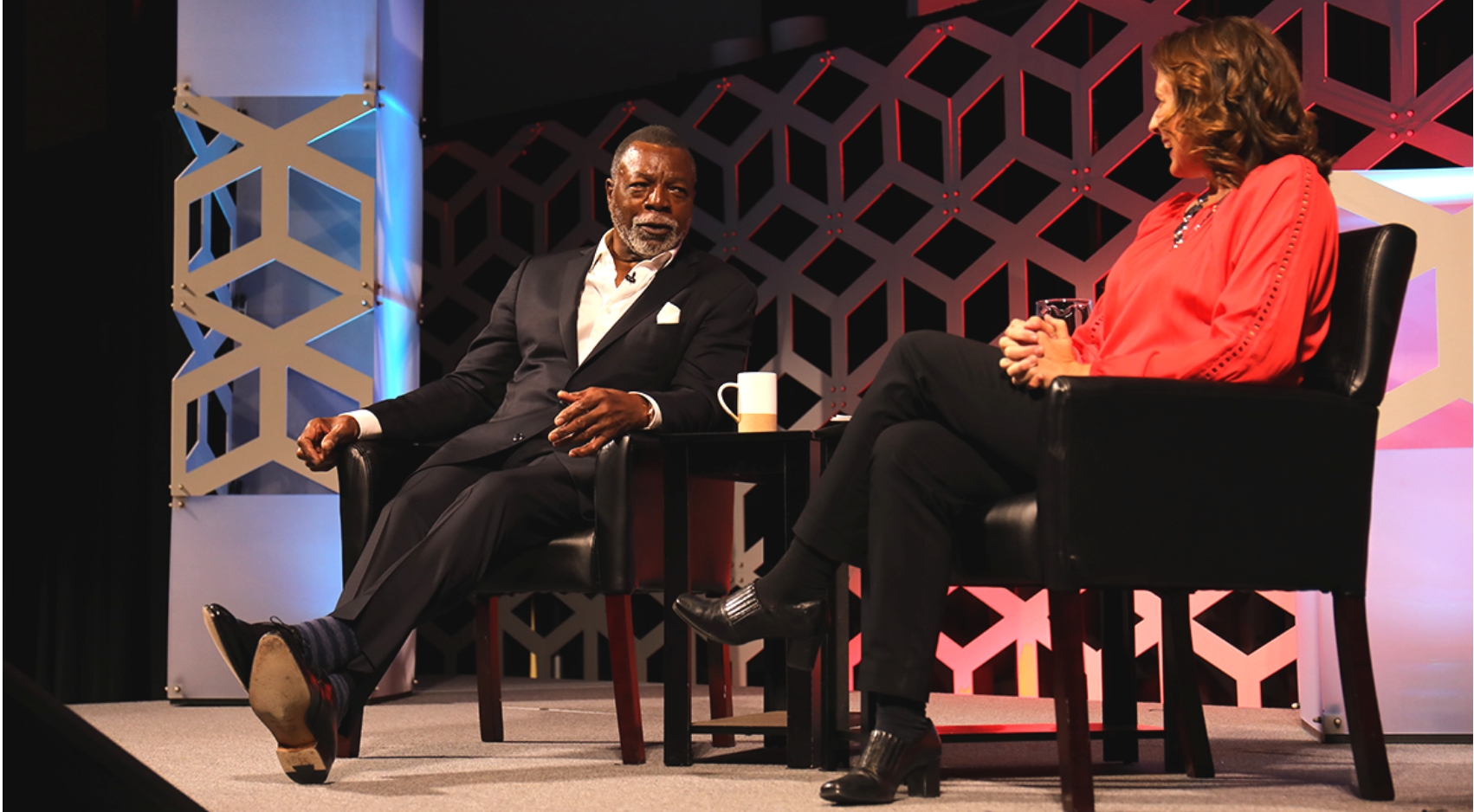 SDSU alumnus Carl Weathers (left) and Tammy Blackburn share a laugh during the max capacity Presidents Lecture Series event at Montezuma Hall on Thursday, Feb. 2, 2023. (Photo: Mario Sevilla)