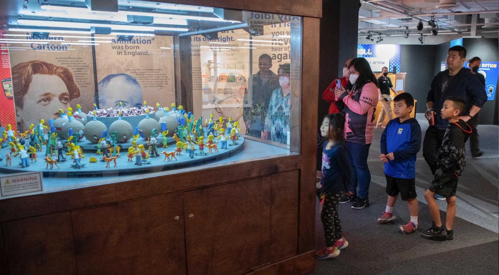 Visitors to the Comic-Con Museum Animation Academy exhibit in front of the animation zoetrope. (Courtesy of Comic-Con International)