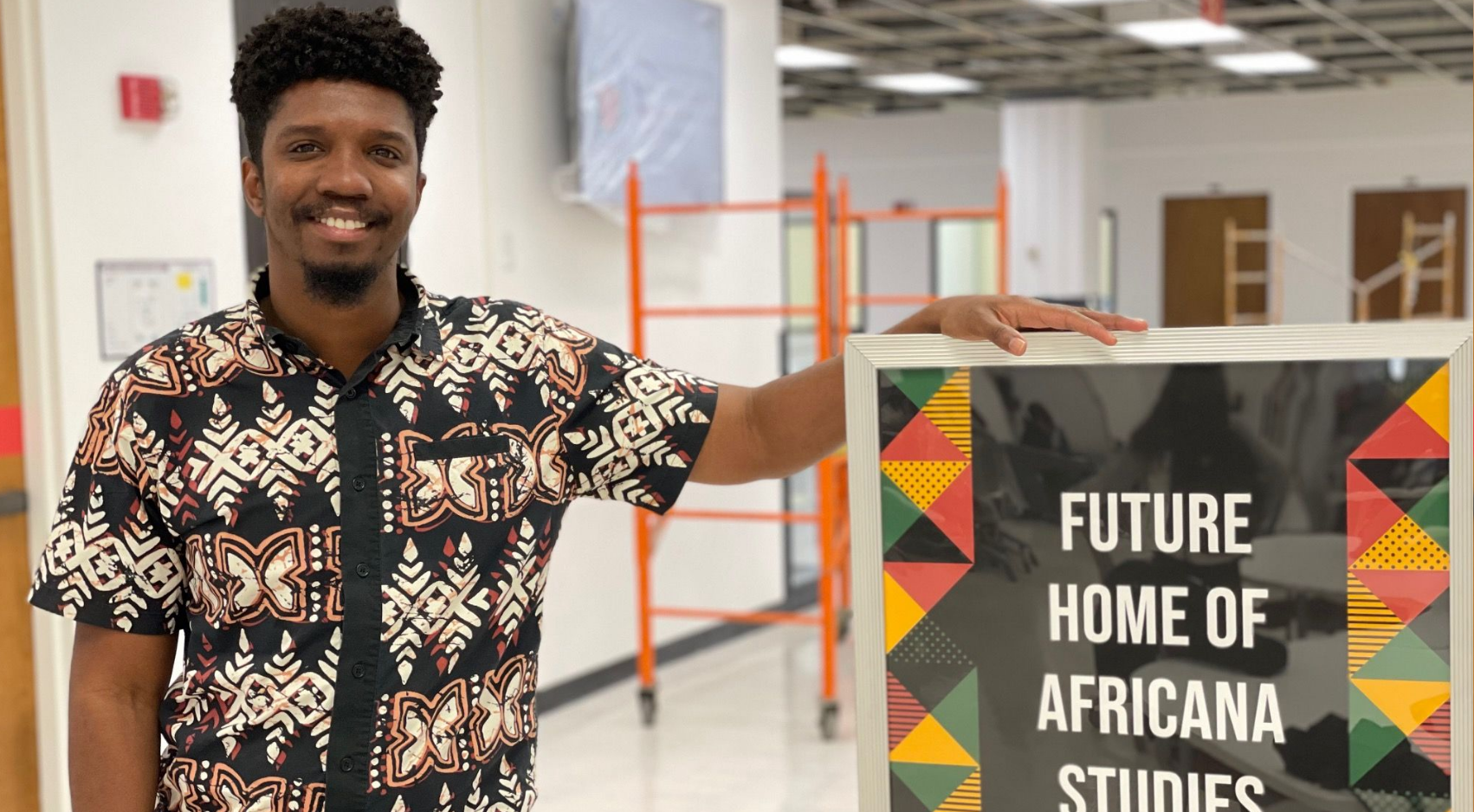 Taharka Ad, an assistant professor from Africana Studies, at the site of the expanded Africana Studies collection which will also feature new study rooms, tables, chairs and clustered seating. (SDSU)