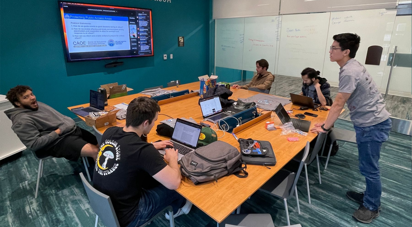 Team AzTechs work on their safe evacuation system submission in the William G. Tong Conference Room in the Engineering and Interdisciplinary Sciences (EIS) Building.