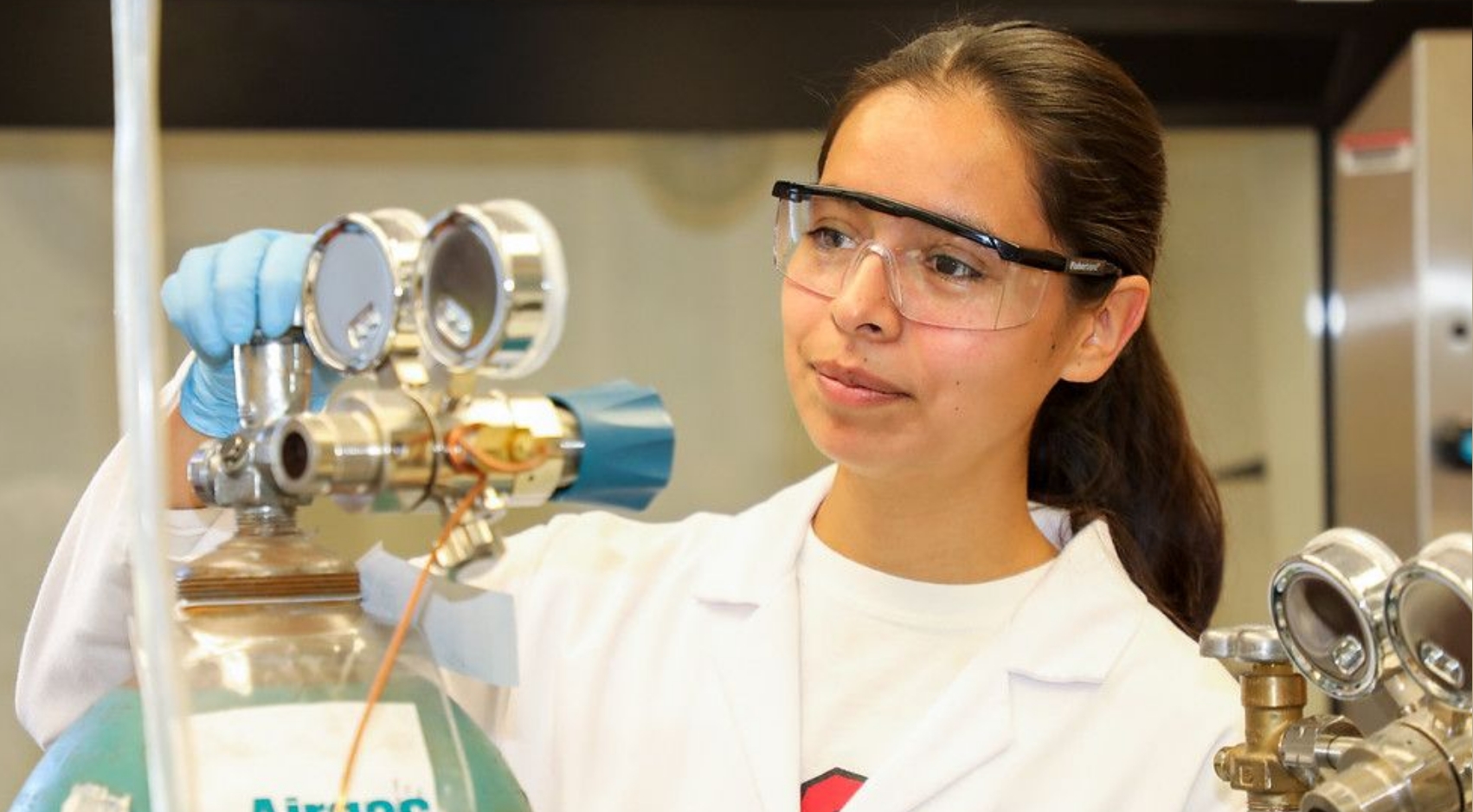 A student works in a laboratory at SDSU's School of Public Health. The signing of SB 684 enables SDSU to add the DrPH as part of the universitys academic degree offerings.