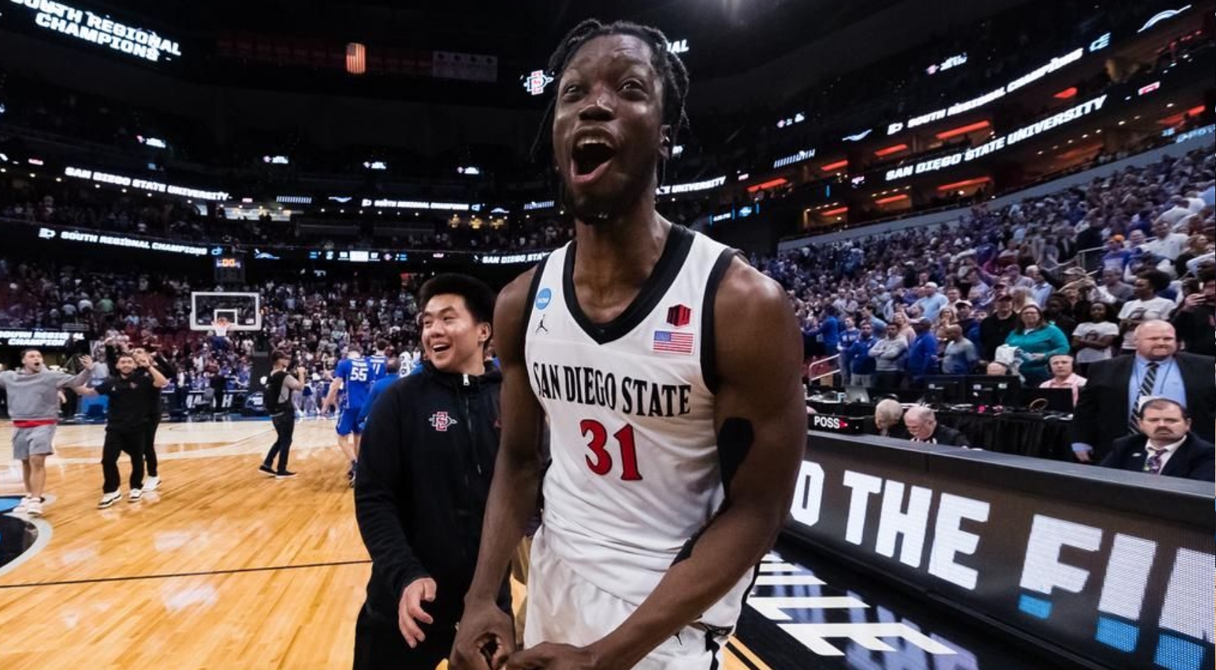 Nathan Mensah (31) celebrates SDSUs victory over Creighton 57-56 to advance to the Final 4 of the NCAA Mens Basketball Championship, Sunday, March 26, 2023. (Credit: Derrick Tuskan/SDSU)