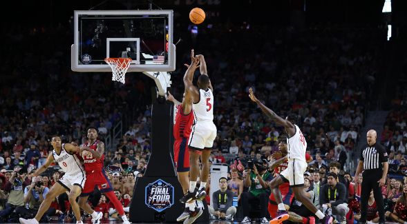 SDSU guard Lamont Butler attempts a shot over an FAU defender during their Final Four game at NRG Stadium in Houston, Texas, Saturday, April 1, 2023. (SDSU)