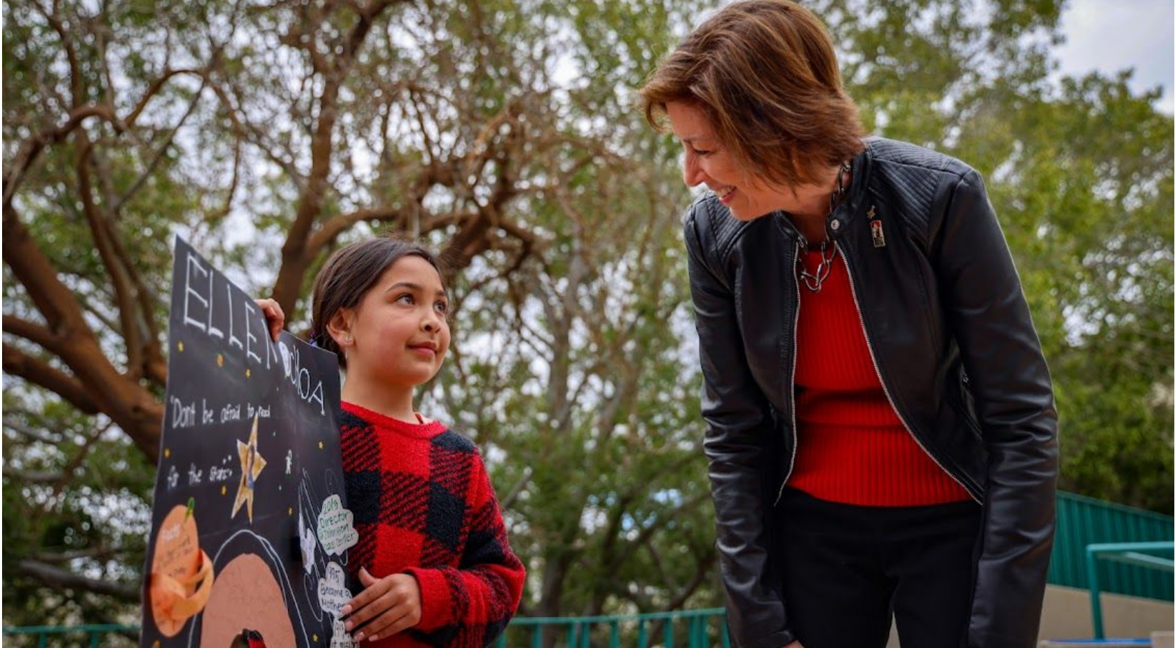 Ellen Ochoa, right, meets with a young aspiring scientist during SDSU's dedication ceremony of the Ellen Ochoa Pavilion on Friday, May 5, 2023. (Rachel Crawford / SDSU)