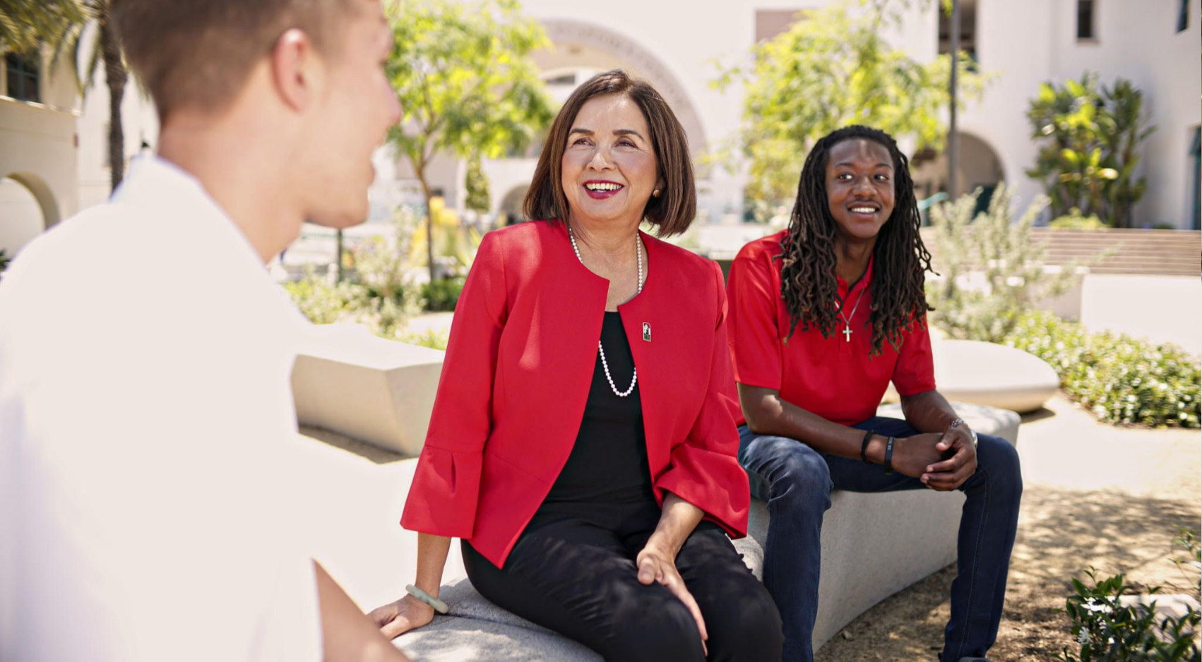 SDSU President Adela de la Torre talks with students on campus. She was appointed to serve as a member on the Homeland Security Academic Partnership Council through June 13, 2025. (SDSU)