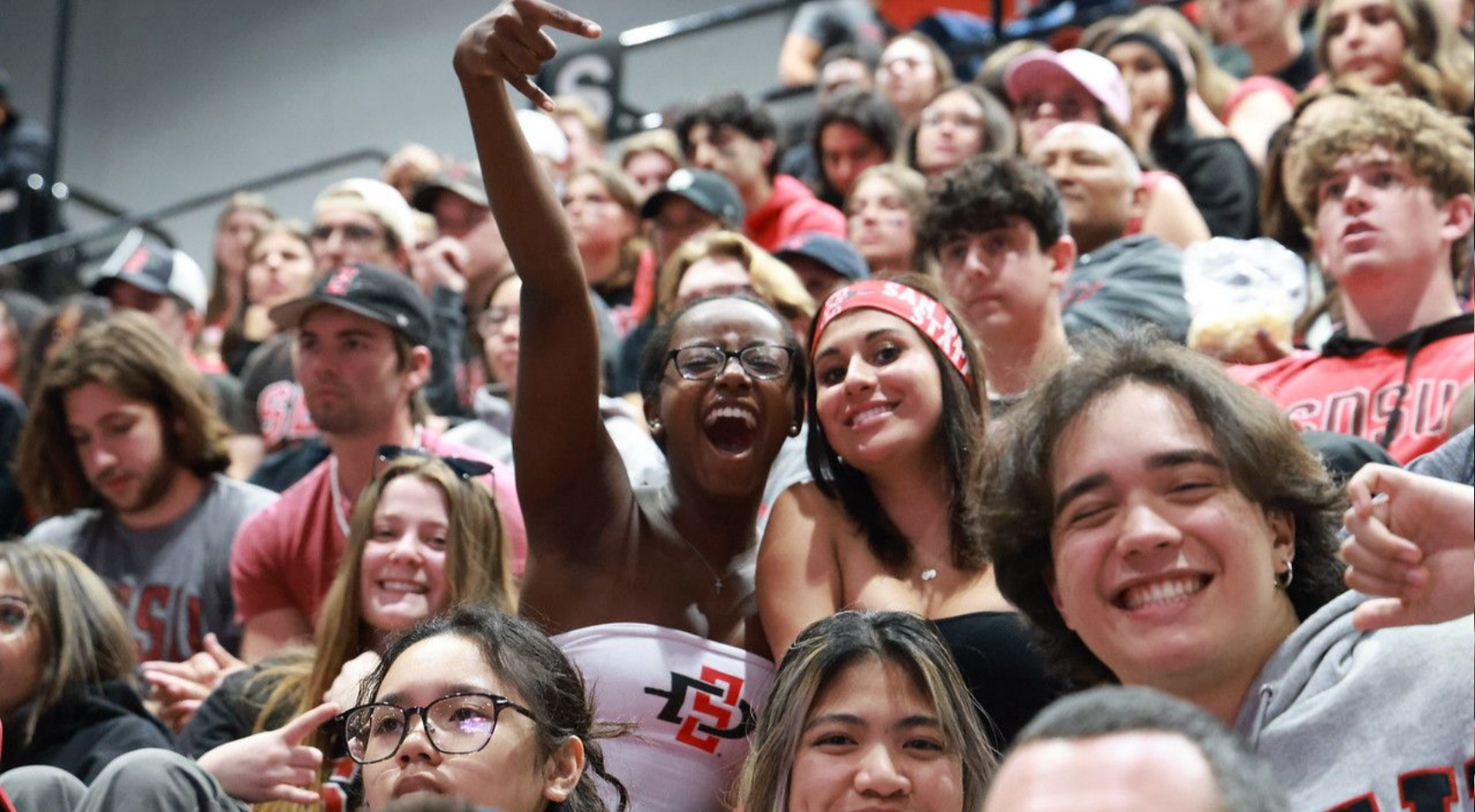 Students cheer on the Aztecs men's basketball team during an NCAA championship game watch party at Viejas Arena. (SDSU)