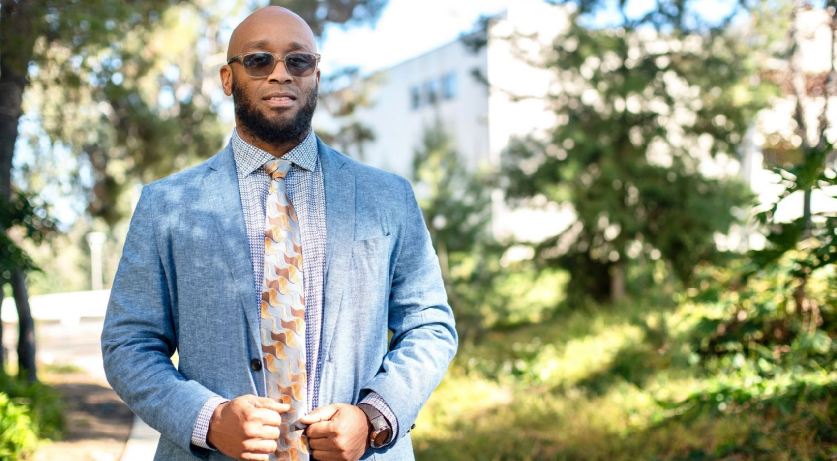 James Wright, assistant professor in SDSU's Department of Educational Leadership, posed outside Lamden Hall.