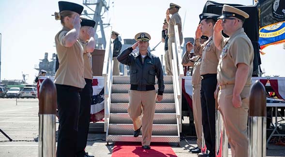 U.S. Naval Captain Ted Carlson (center) saluted at his Change of Command ceremony March 17, 2023.