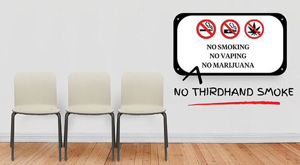A room that contains three chairs and a sign that reads NO SMOKING NO VAPING NO MARIJUANA with a hand-drawn caret adding the words NO THIRDHAND SMOKE, underlined in red.