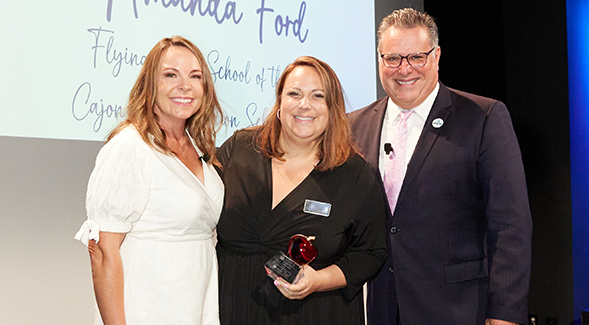 Amanda Ford (center) posed with Chanelle Hawken, Cox Communications vice president, Public and Government Affairs, and  Paul Gothold, San Diego County Superintendent of Schools. (Photo: Terri Rippee)