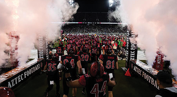 The SDSU football team takes the field at Snapdragon Stadium. (SDSU)