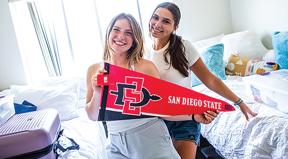Two students move into their dorms at SDSU on Move-in Day, Aug. 16, 2023. (SDSU)