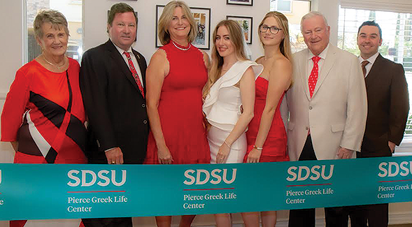 Frederick Pierce and Christine Pierce (second and third from left) were joined by family, friends and members of the SDSU community to celebrate at the Pierce Greek Life Center. (Sharon Penny/SDSU)
