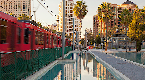 San Diego train whizzing through the Children's Park in Martin Luther King Jr. Promenade. (Adobe Stock)