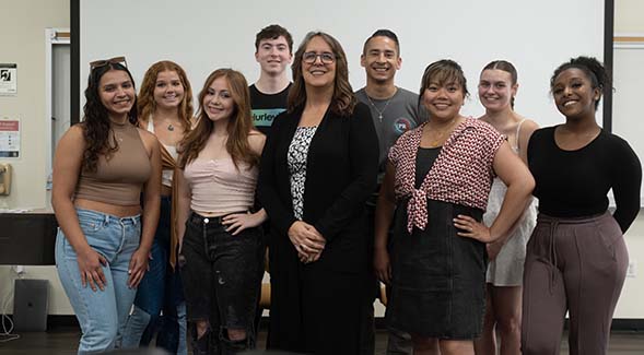 Lisa Gates (center), director of the new leadership studies major, posed with students currently enrolled in a leadership class.  (Photo: Arturo E. Rivas)