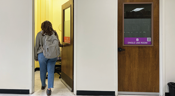 A student enters a single-use room at Love Library. Four new, single-use study rooms can now be reserved by anyone with an SDSU ID for virtual classes or appointments (Dania Mukahhal/SDSU)