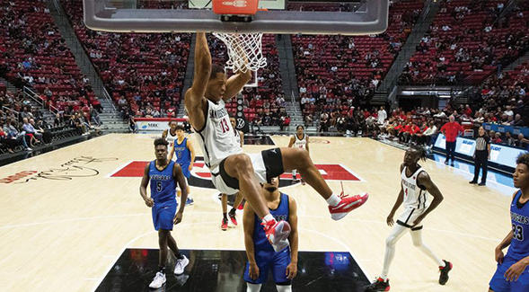 SDSU senior forward Jaedon LeDee dunks in a game against CSU San Marcos. (SDSU)