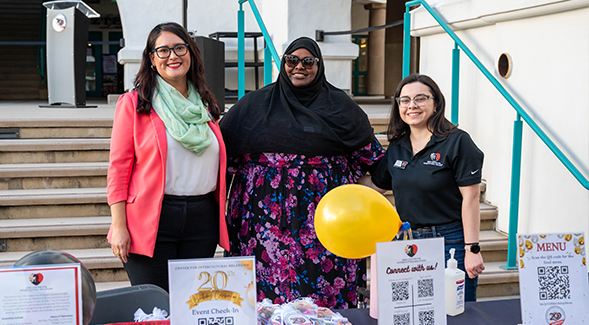 (From left) Daniela Saldana Gurgol, CIR Director, Ikram Aweys, CIR Coordinator, and Danya Youhanna, CIR Graduate Assistant, are photographed during an event at SDSU. (E. Good/SDSU)