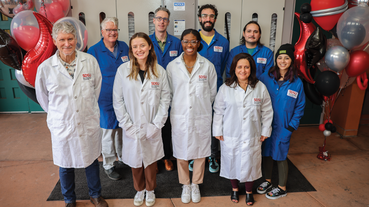 Back row: College of Sciences dean Jeff Roberts, Chemistry and Biochemistry Associate Professor Christopher Harrison, Chemistry PhD student Joe Charlonis, Chemistry Master’s student Sergio Reneria, Chemistry PhD student Jessica Torres; Front Row: College of Sciences Associate Dean Tod Reeder, master’s student Bryn Baxter, master’s student Ty'Tianna Clark, Division of Research & Innovation Vice President Hala Madanat (Rachel Crawford/SDSU)