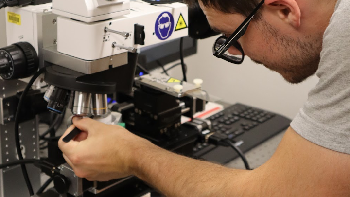 Caption: Second-year Physics master’s student Nicholas Schottle is preparing a moiré quantum material in the Quantum Materials Design and Growth Lab. (Bryana Quintana/SDSU)