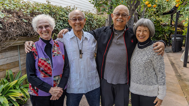 Janice Dong(left) and her husband Ron with Lloyd Dong Jr. and his wife Girina during a visit to the brothers' childhood home in Coronado. (SDSU)