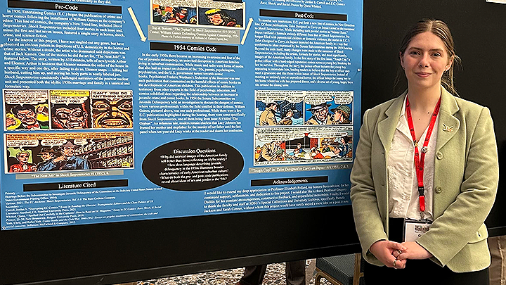 Grace Dearborn presenting her poster at the American Historical Association's annual conference