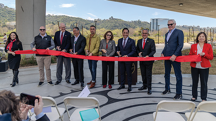 SDSU President Adela de la Torre is joined by San Diego Mayor Todd Gloria and local dignitaries at the SDSU Mission Valley Park ribbon cutting ceremony.