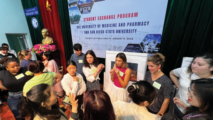 San Diego State University and Hue University students engaging in conversations during exchange program in Vietnam.