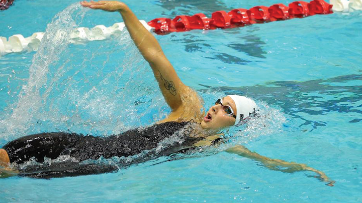 SDSU swimmer doing the backstroke in the pool