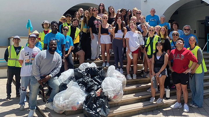 SDSU students pose for a photo after the Good Neighbor event