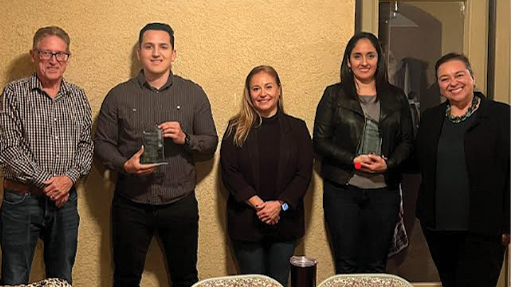 SDSU Imperial Valley dean and staff join Christian Jimenez for a photograph.