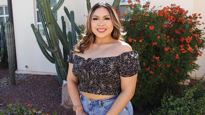 Aima Ruvalcaba takes a photo at the campus of SDSU Imperial Valley