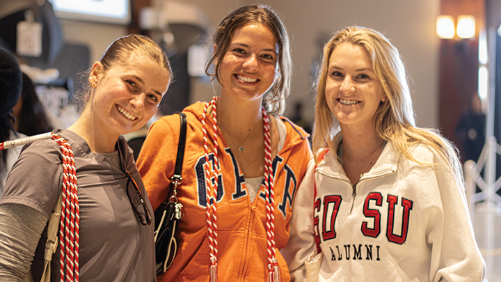 three female SDSU students socializing