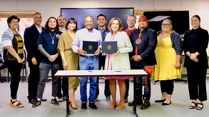 Kumeyaay Community College and SDSU leaders celebrate signing of their partnership agreement.